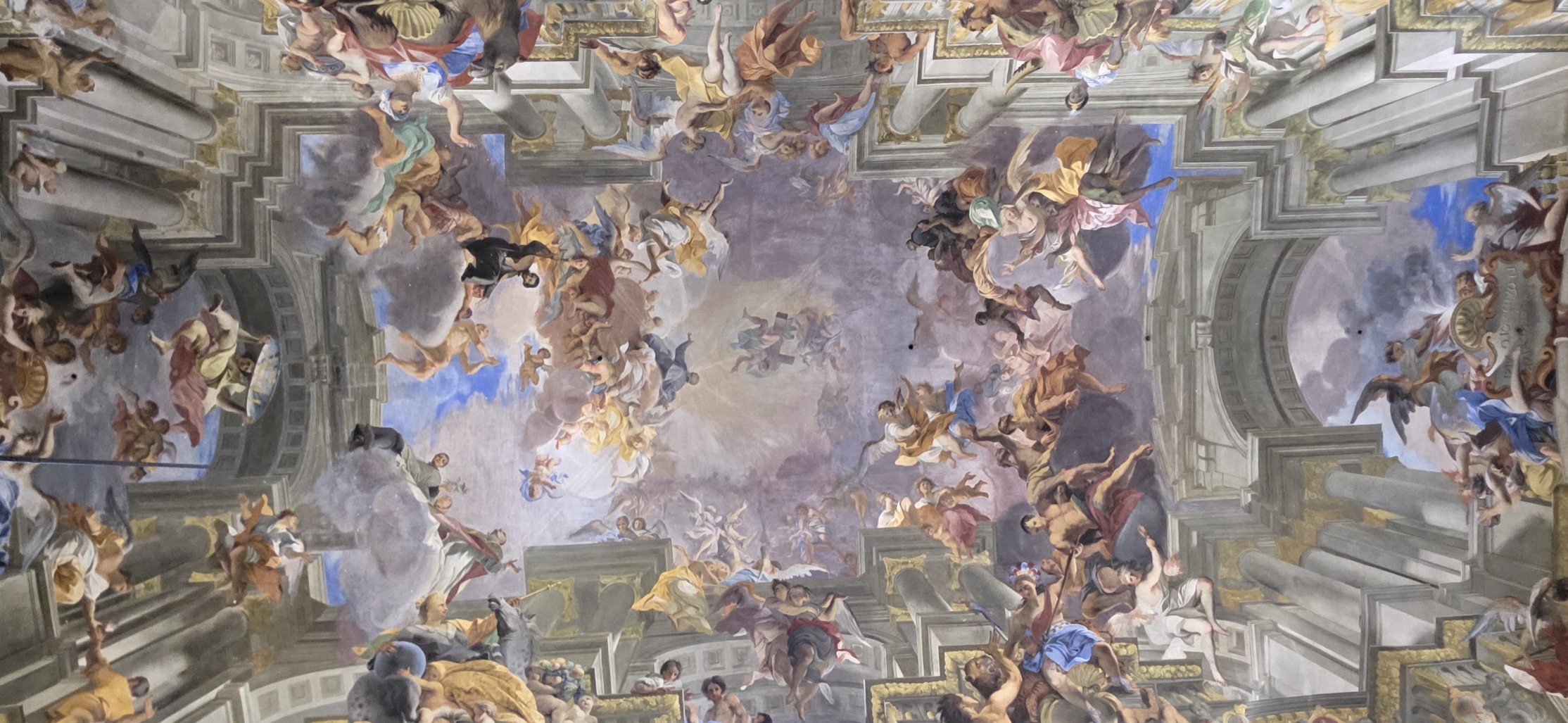 The full length of a baroque painted church ceiling